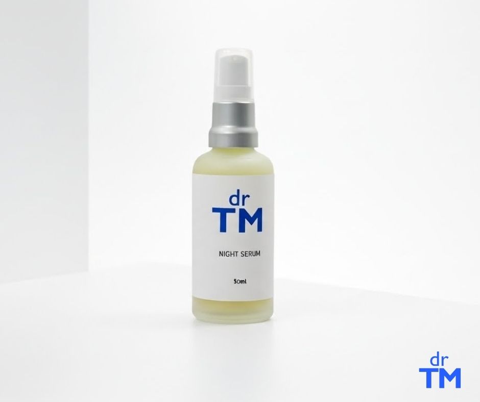 DR TM Night Serum bottle, cream label
